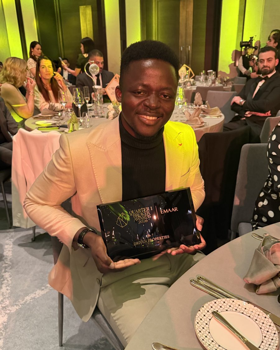 Umar holding the Emaar Quarter 1 Broker Awards 2026 trophy for Driven Properties