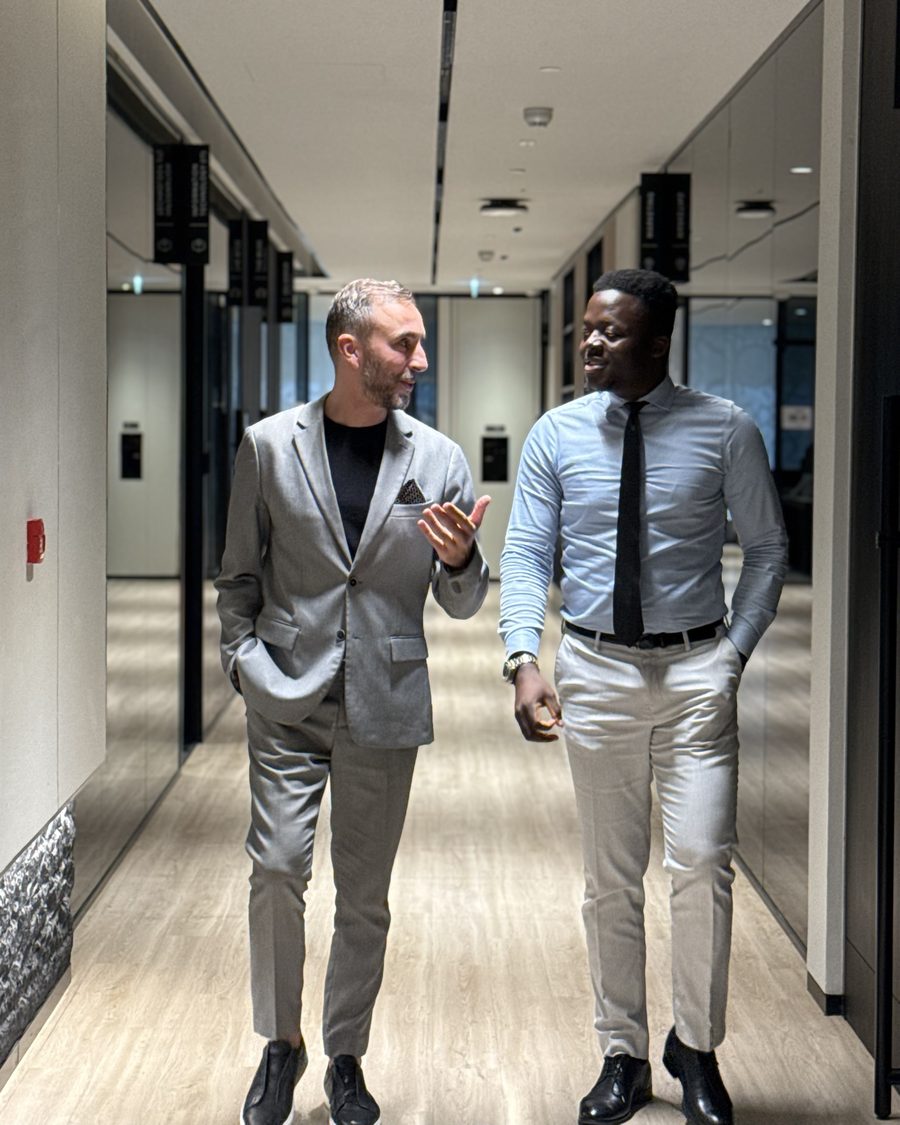 Umar discussing a property decision with a colleague
